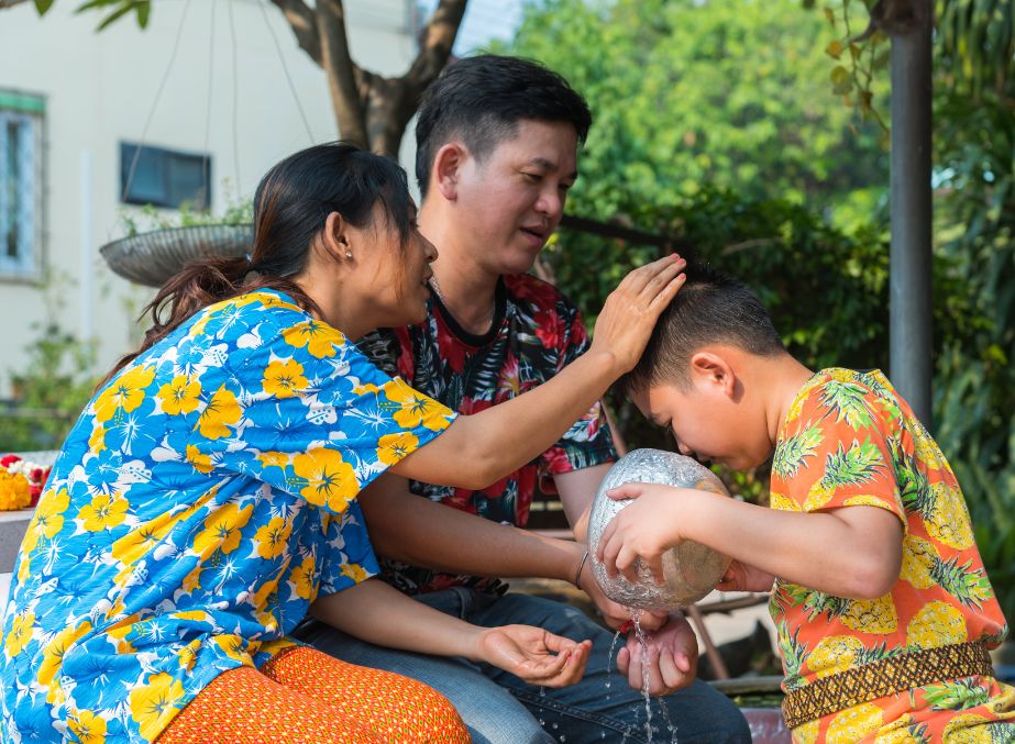 Family celebrating Songkran